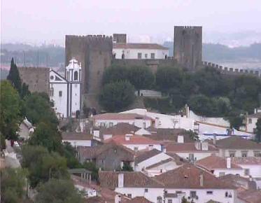 Obidos can bee seen is a day tour from Lisbon. A private tour would let you stay the all day.