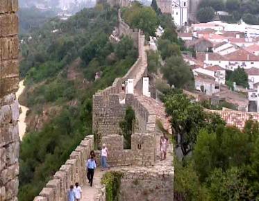 Obidos can bee seen is a day tour from Lisbon. A private tour would let you stay the all day.