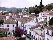 Recorridos en Lisboa con una Agencia de Viajes de Portugal. Excursiones de lujo con un Tour Operador Portugu�s. Tours en limusine de Lisboa para Fatima, Obidos, Estoril, Sintra, Pena, Coimbra, Evora, Oporto.